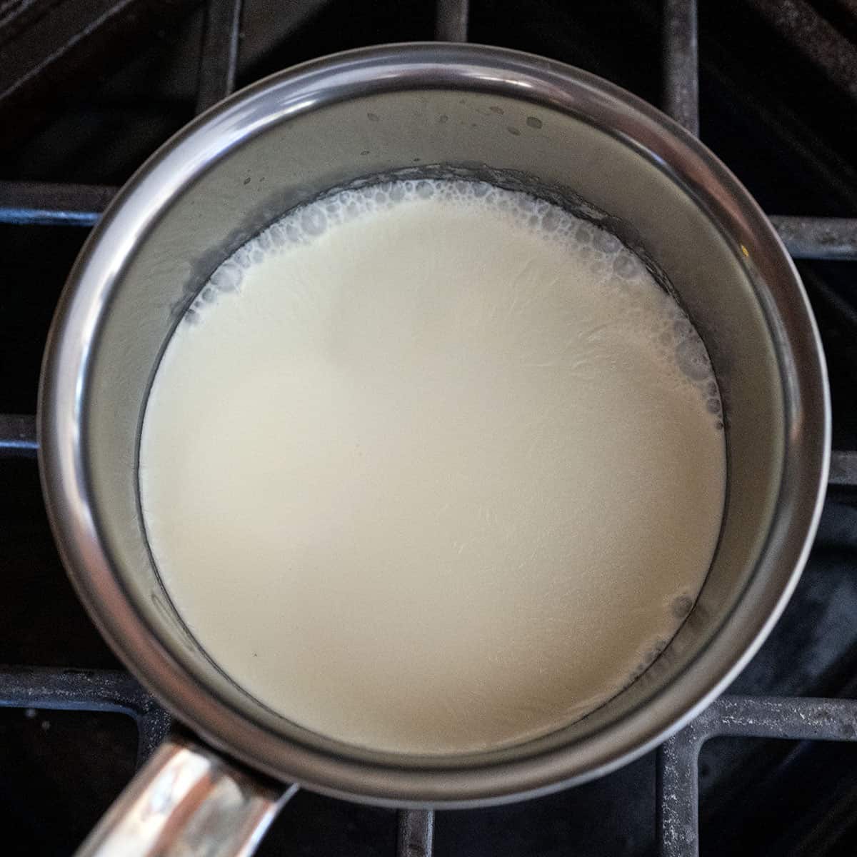 cream simmering in pot.