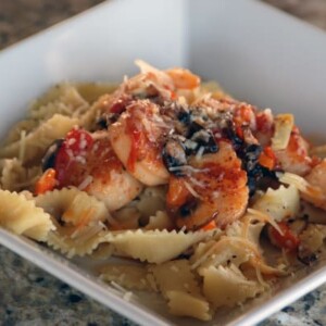 Seared scallops on fresh pasta.