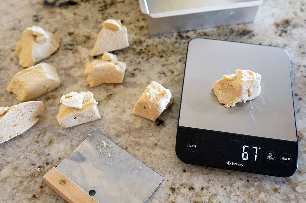 Cutting and weighing brioche dough.