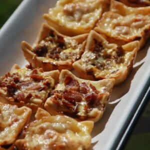 plate full of mini quiches