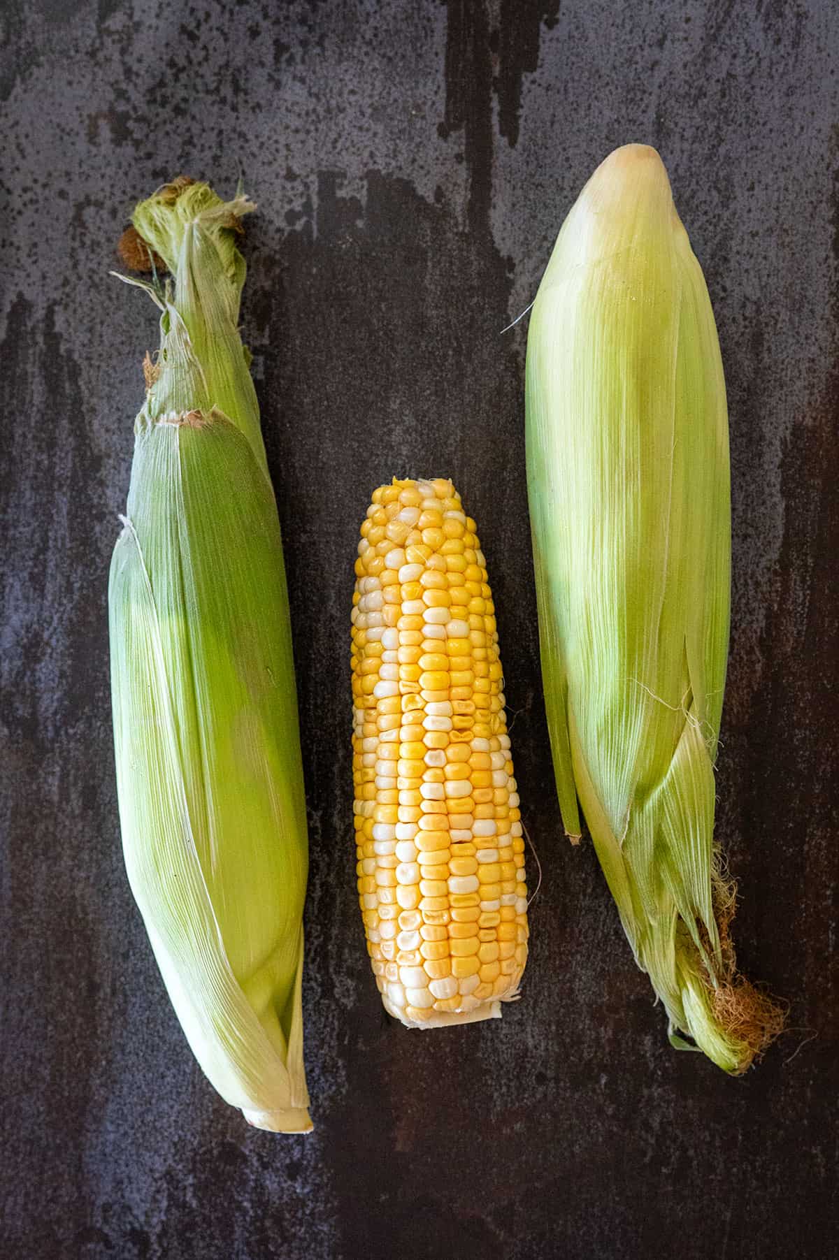 Three ears of corn.
