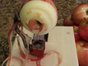 removing peel from apples.