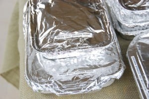 pans covered with foil stacked.