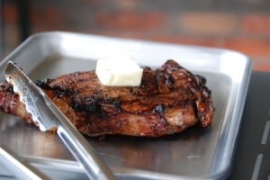 steak resting with butter on top.