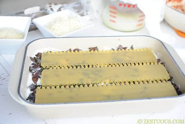 layer of noodles on top of mushroom layer