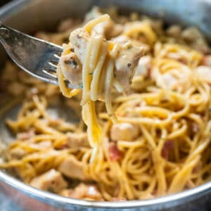 Forkful of chicken carbonara.
