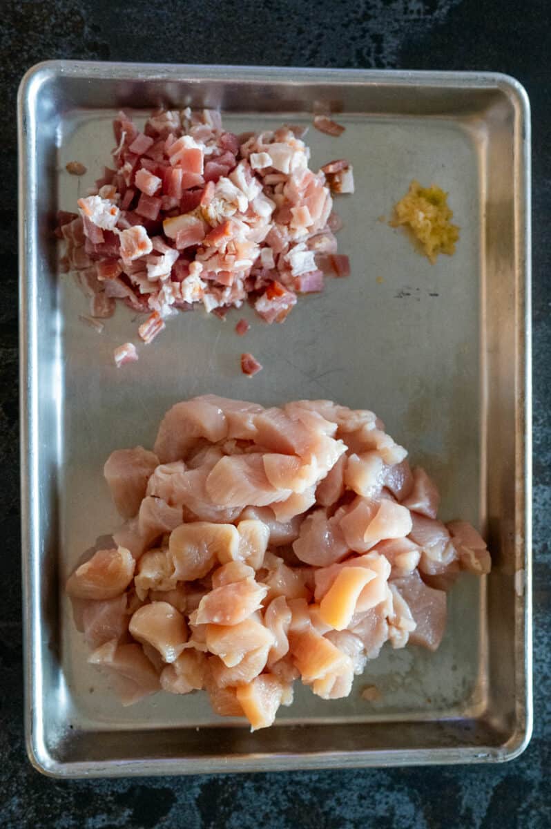 Chopped bacon, chicken and garlic.