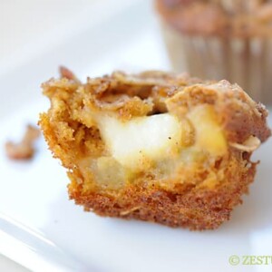 cross section of pumpkin muffin filled with brie