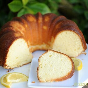 bundt cake cut open with a slice of bundt cake on a white plate