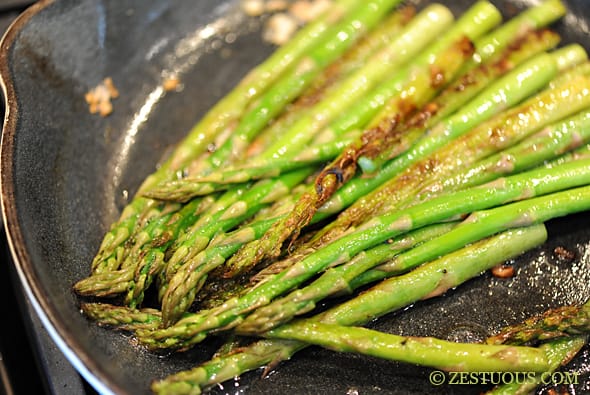 asparagus sautéing in pan