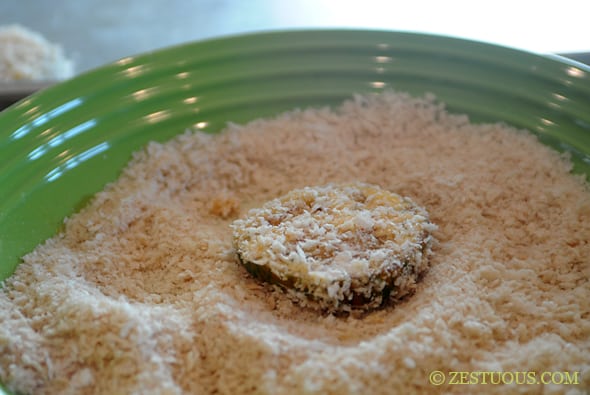 tomato slice dipped into breadcrumb mixture