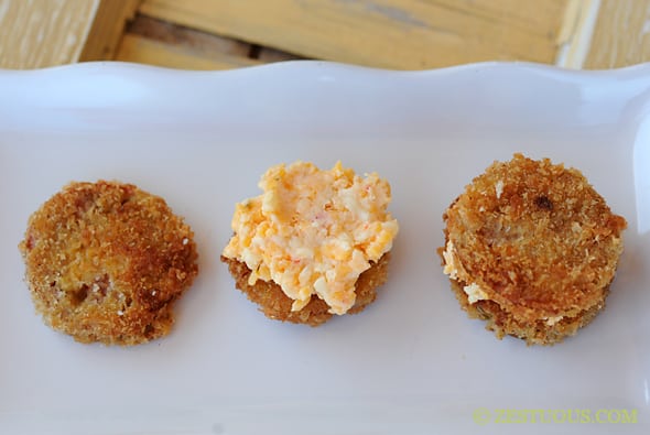 fried green tomato slices with pimento cheese in the middle