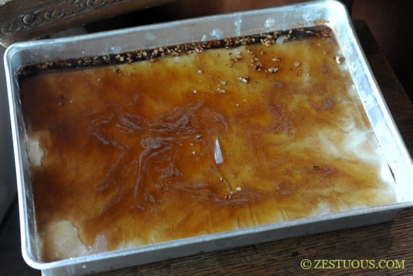 phyllo dough with syrup poured on it