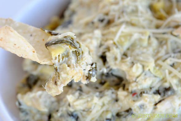 Triple Cheese Slow Cooker Spinach Artichoke Chicken Dip from Zestuous