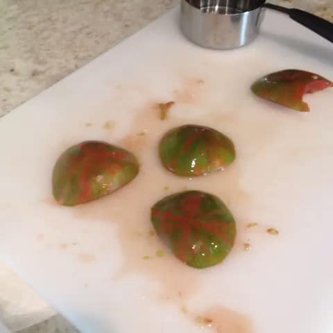 green tomatoes cut in half