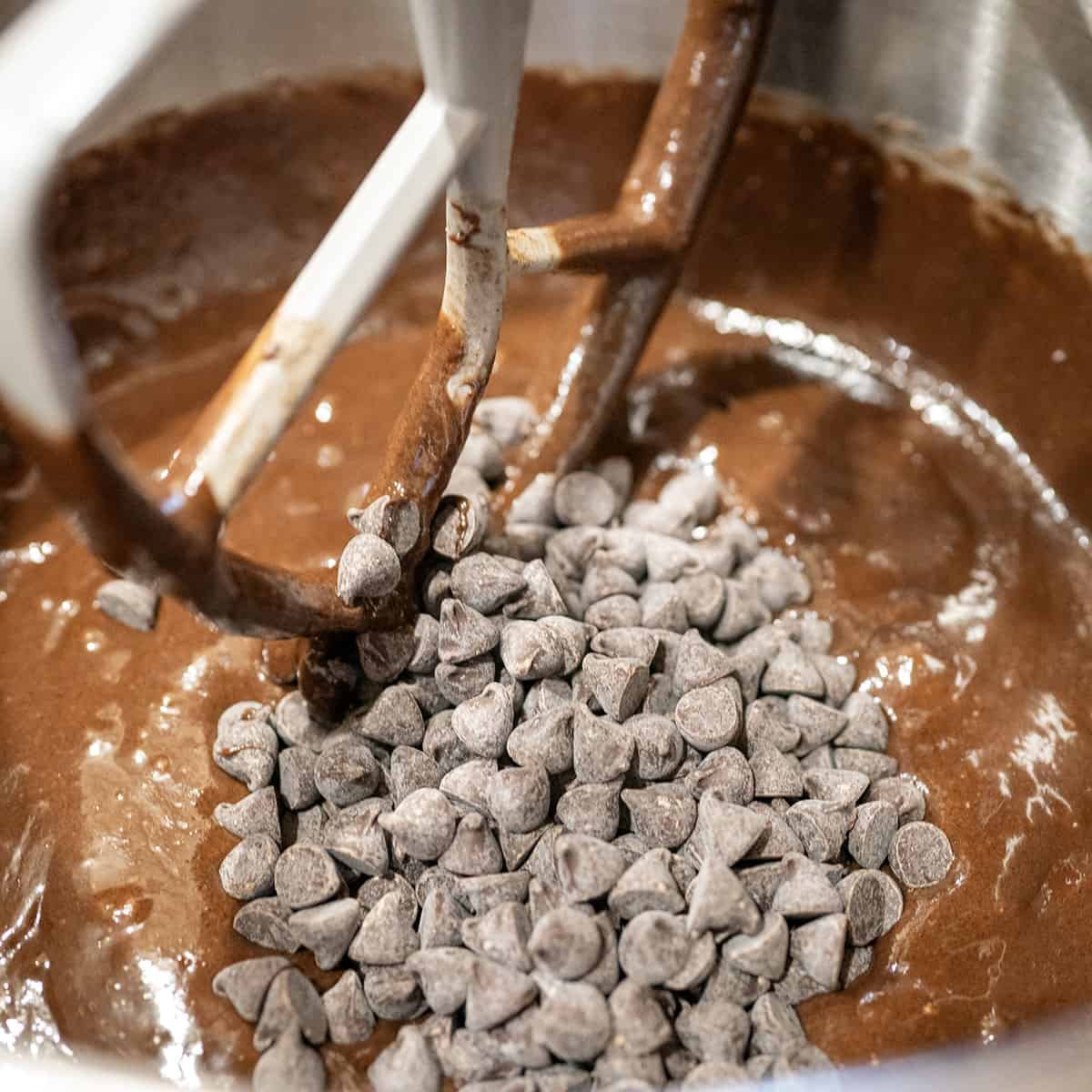 adding chips to batter.